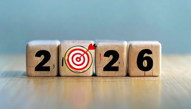  2026 Year Target Concept with Icons on Wooden Cubes 
